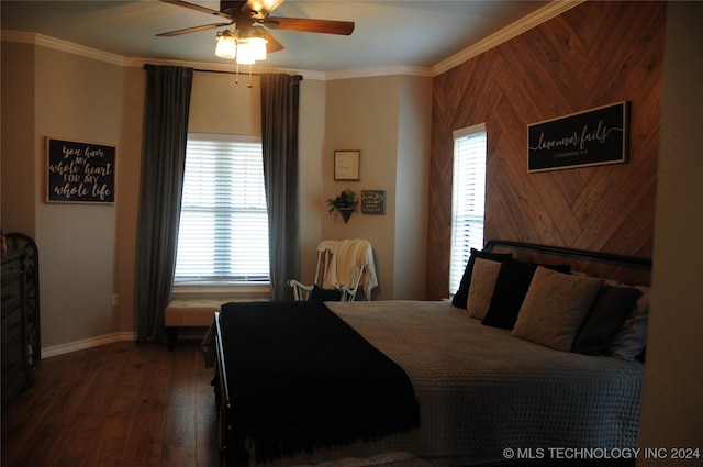 bedroom featuring dark wood-type flooring, ceiling fan, and crown molding