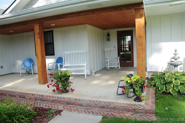 entrance to property with covered porch