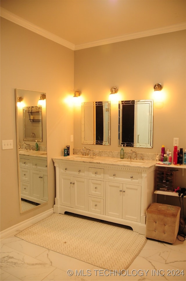 bathroom featuring vanity and ornamental molding