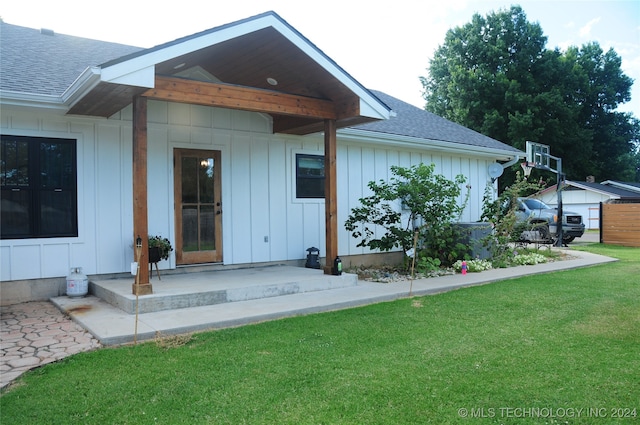 exterior space with a lawn