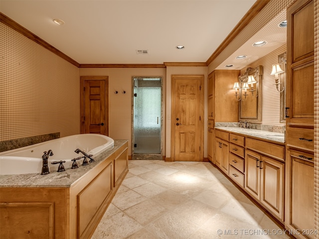 bathroom with crown molding, vanity, and independent shower and bath