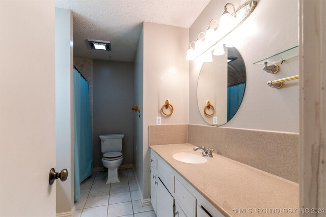 815 S Oak Grove Rd, Cushing, OK 74023 - full bath featuring vanity, tile patterned floors, a textured ceiling, and a shower with curtain