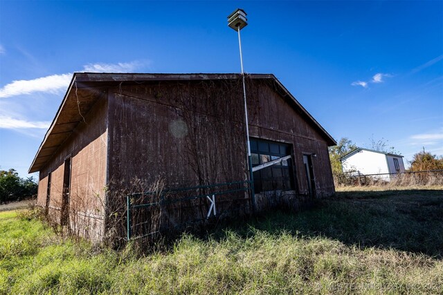 815 S Oak Grove Rd, Cushing, OK 74023 - view of home's exterior with a barn and an outbuilding
