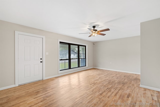 entryway with ceiling fan and light wood-type flooring