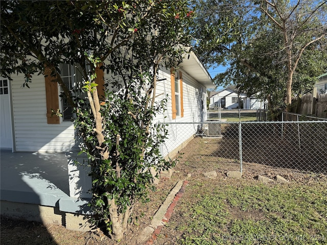 view of yard with central AC