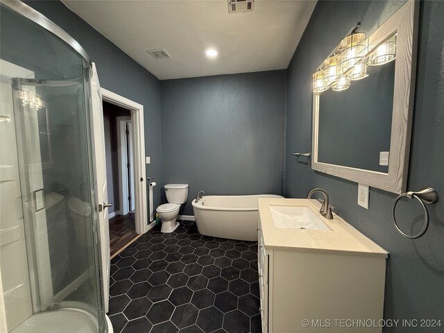 full bathroom with toilet, shower with separate bathtub, vanity, and tile patterned flooring