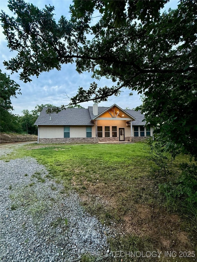 2516 Elm, Sulphur, OK 73086 - rear view of house featuring a lawn and stone siding
