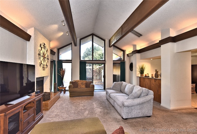 living room with beam ceiling, carpet floors, a textured ceiling, and high vaulted ceiling