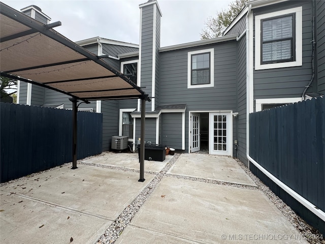 back of house featuring a patio and central AC