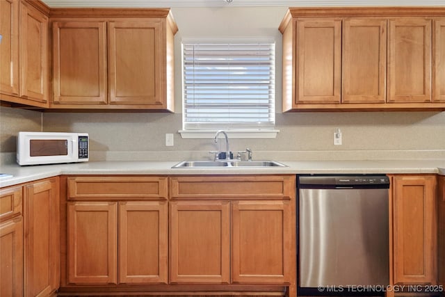 kitchen featuring stainless steel dishwasher and sink