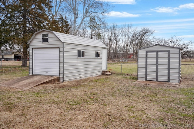 garage featuring a yard