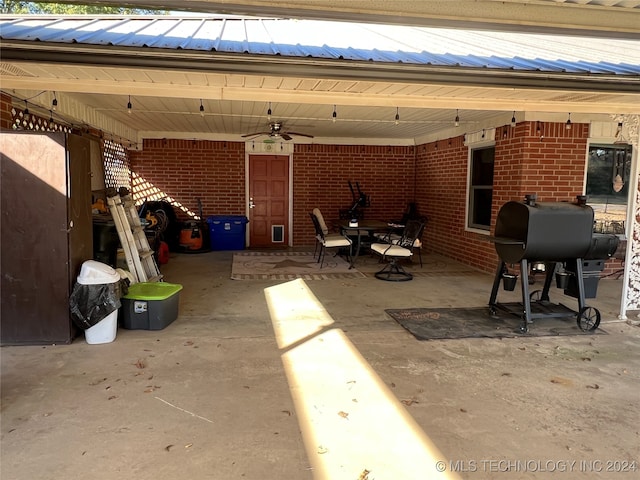 view of patio with ceiling fan and area for grilling