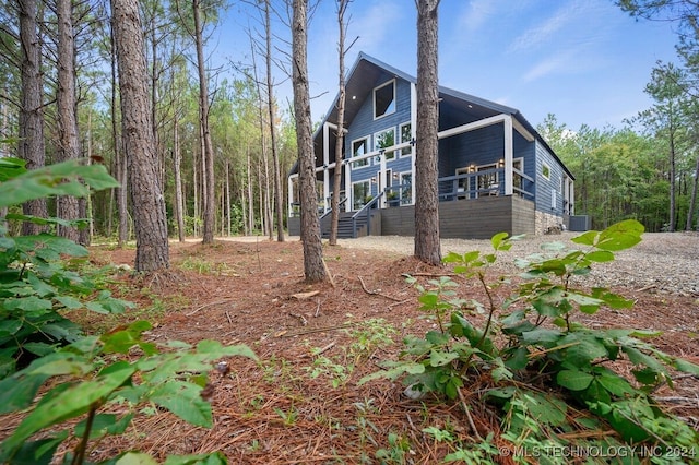 view of side of property featuring cooling unit