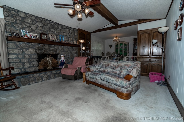 carpeted living room featuring a fireplace, ceiling fan with notable chandelier, a textured ceiling, and vaulted ceiling with beams