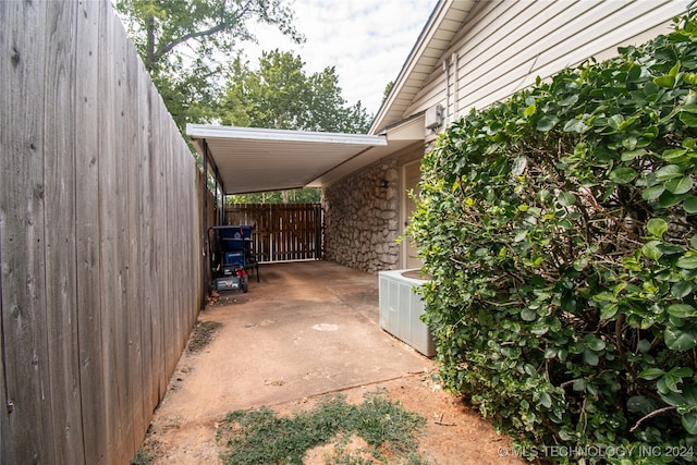 view of car parking with a carport