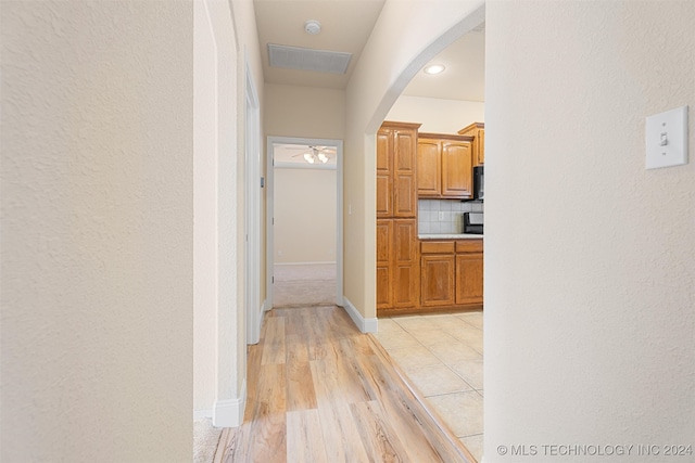 hall featuring light hardwood / wood-style flooring