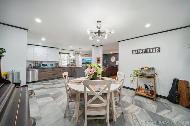 dining area with a notable chandelier