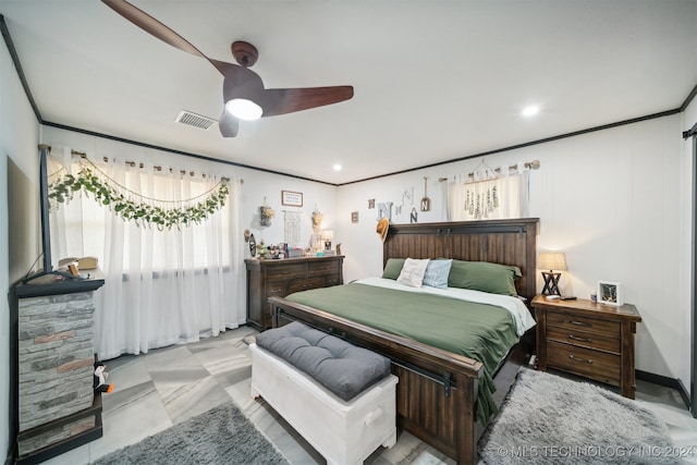 bedroom featuring crown molding and ceiling fan