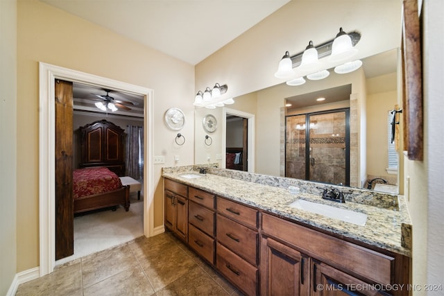 bathroom featuring walk in shower, ceiling fan, and vanity