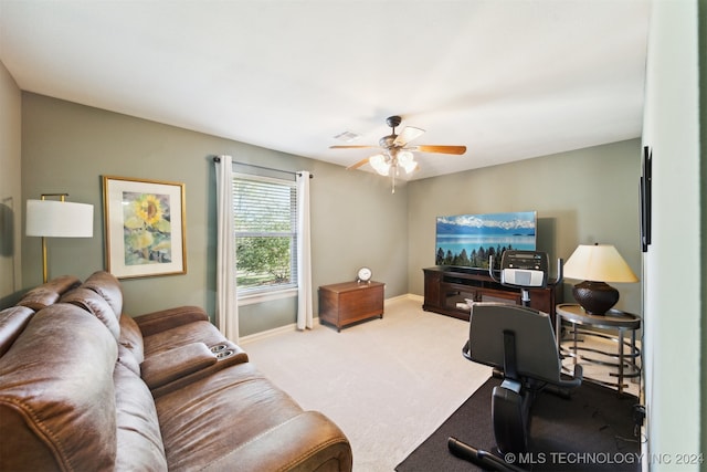 living room with carpet floors and ceiling fan