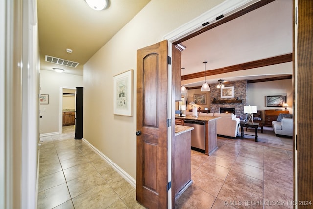 hallway with light tile patterned floors