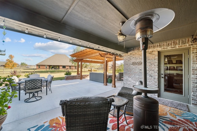 view of patio with an outdoor hangout area and a pergola