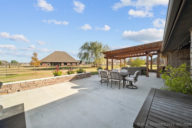 view of patio featuring a pergola