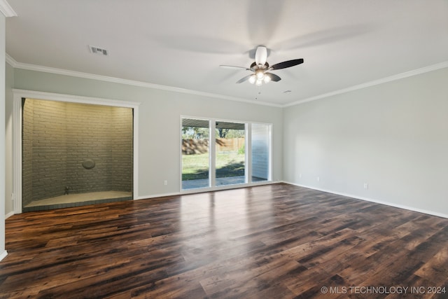 empty room featuring crown molding, dark hardwood / wood-style flooring, and ceiling fan