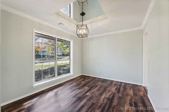 unfurnished dining area featuring a notable chandelier, dark hardwood / wood-style flooring, and crown molding