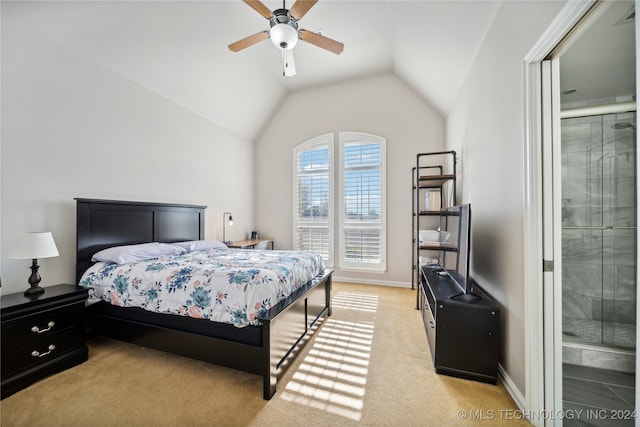 carpeted bedroom featuring lofted ceiling and ceiling fan