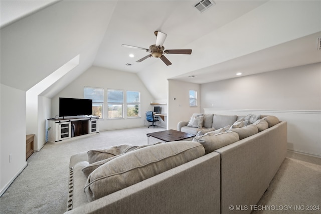 living room featuring ceiling fan, light colored carpet, and vaulted ceiling