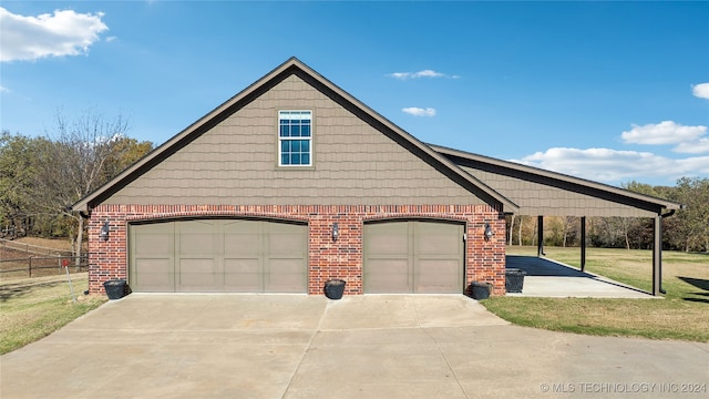 view of front of house with a garage and a front yard