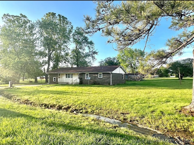 exterior space with a front lawn