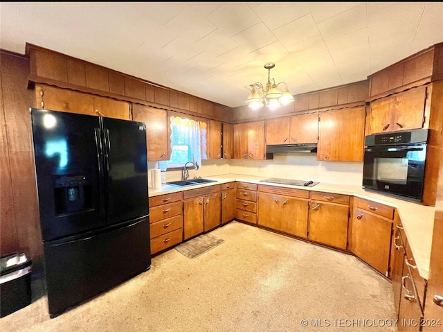 kitchen with light colored carpet, an inviting chandelier, black appliances, sink, and decorative light fixtures