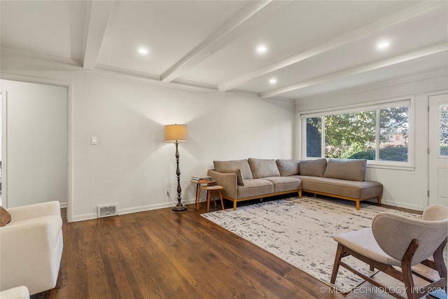 living room with beam ceiling and dark hardwood / wood-style flooring