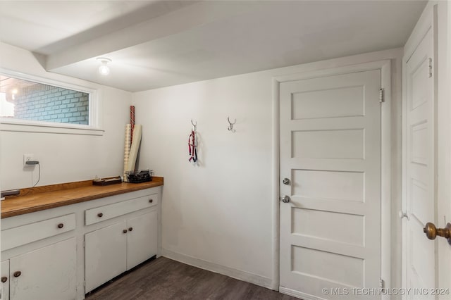 interior space featuring dark wood-type flooring