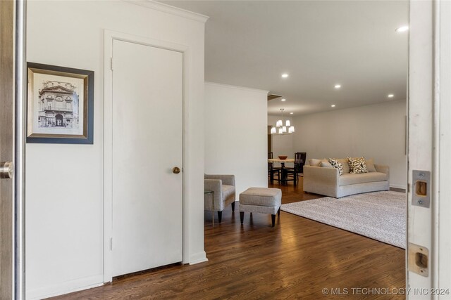 3920 S Utica Ave, Tulsa, OK 74105 - living area featuring ornamental molding, wood finished floors, a chandelier, and recessed lighting