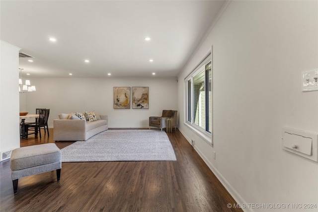 3920 S Utica Ave, Tulsa, OK 74105 - living area featuring a chandelier, recessed lighting, dark wood-type flooring, and baseboards