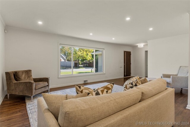 3920 S Utica Ave, Tulsa, OK 74105 - living room featuring recessed lighting, dark wood finished floors, and baseboards