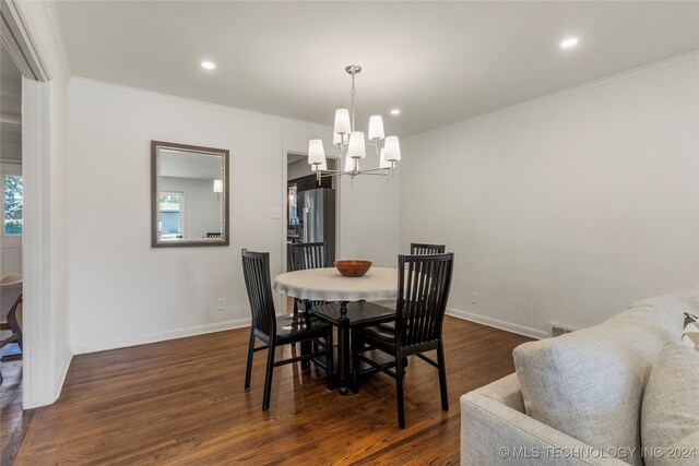3920 S Utica Ave, Tulsa, OK 74105 - dining room featuring dark wood-style flooring, a chandelier, ornamental molding, baseboards, and recessed lighting