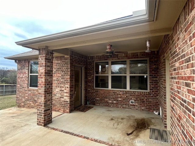 view of patio with ceiling fan