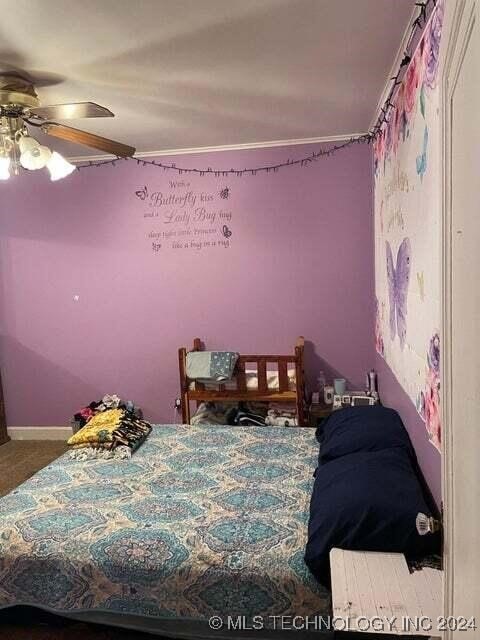 bedroom featuring ceiling fan