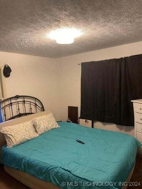 bedroom with a textured ceiling