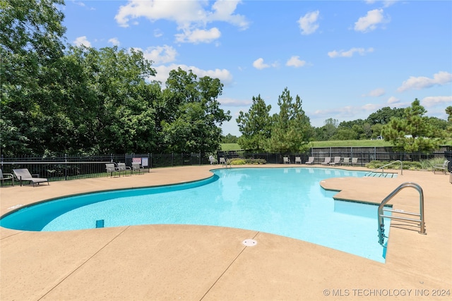 view of pool with a patio area