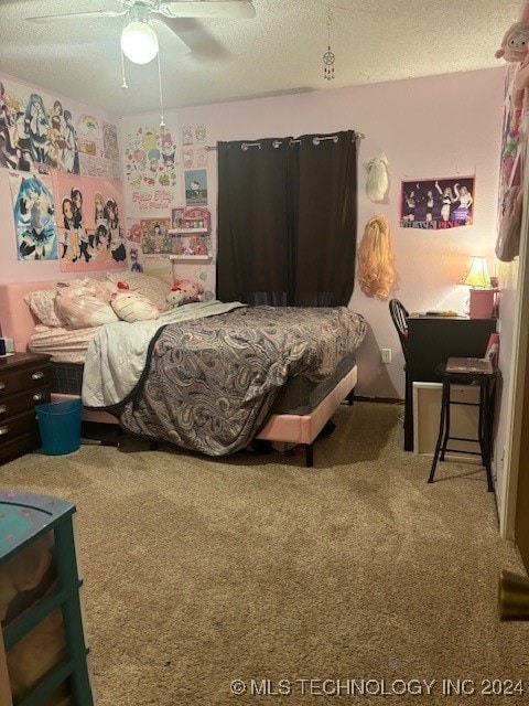 carpeted bedroom with a textured ceiling and ceiling fan