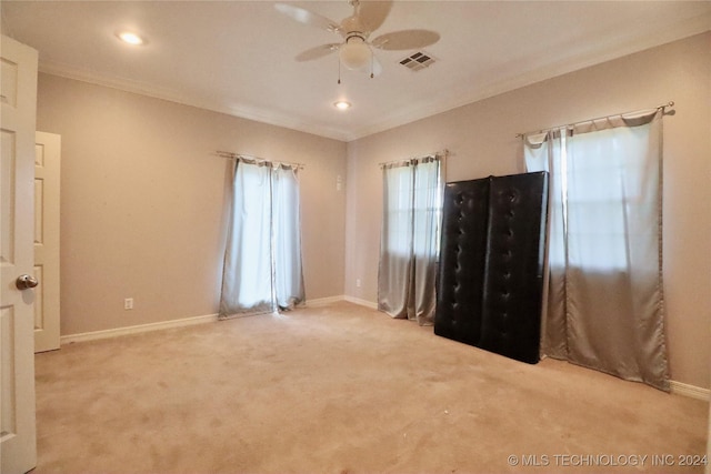 unfurnished bedroom with baseboards, visible vents, carpet floors, recessed lighting, and ornamental molding