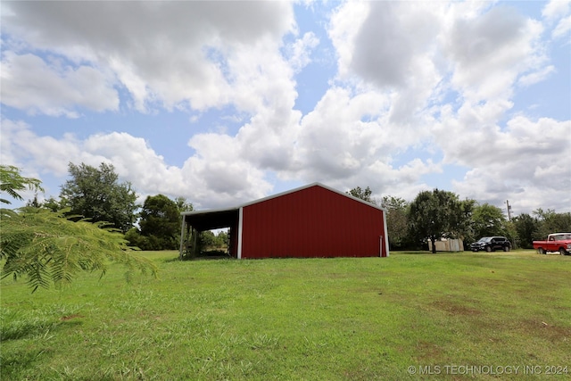 3998 E 173rd St S, Warner, OK 74469 - view of pole building featuring a yard and a carport