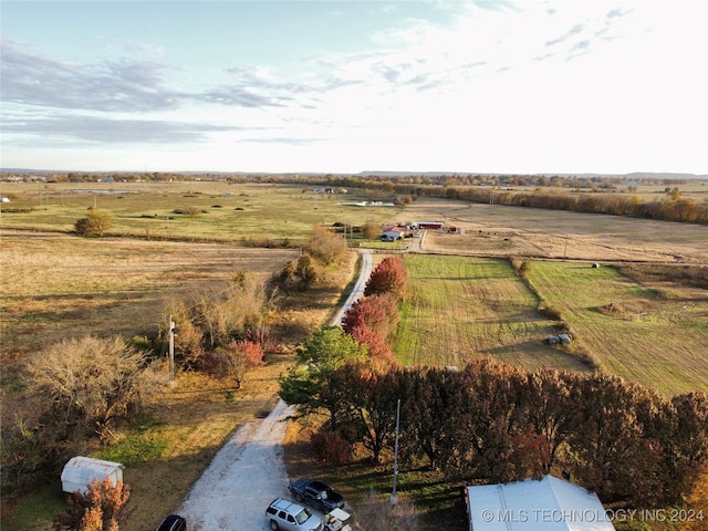 birds eye view of property featuring a rural view