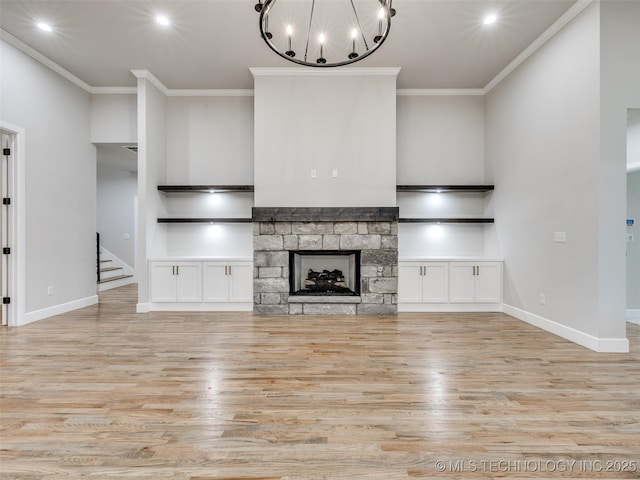 unfurnished living room with wood finished floors, recessed lighting, stairs, and crown molding