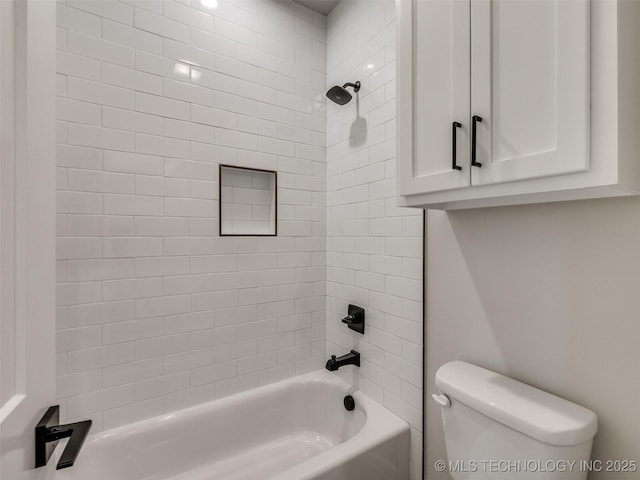 full bath featuring toilet and  shower combination
